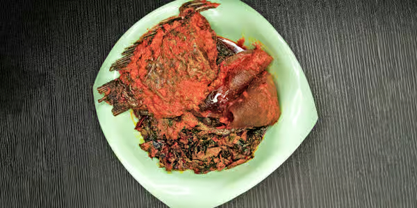 Yoruba Efo Riro spinach stew with palm oil and assorted meats